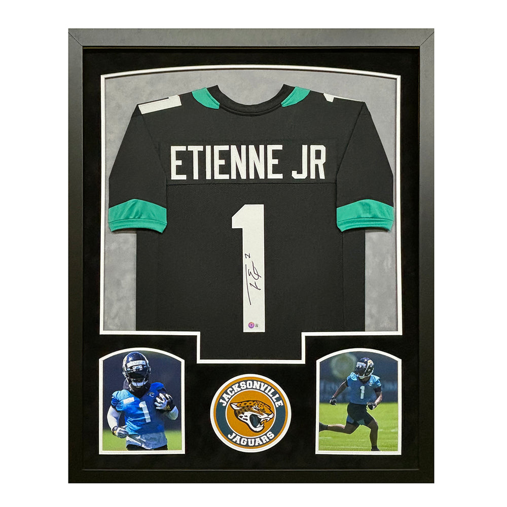 Travis Etienne Signed Jacksonville Black Custom Suede Matte Framed Football Jersey (Beckett)