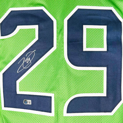 Earl Thomas Signed Seattle Green Football Jersey (Beckett)