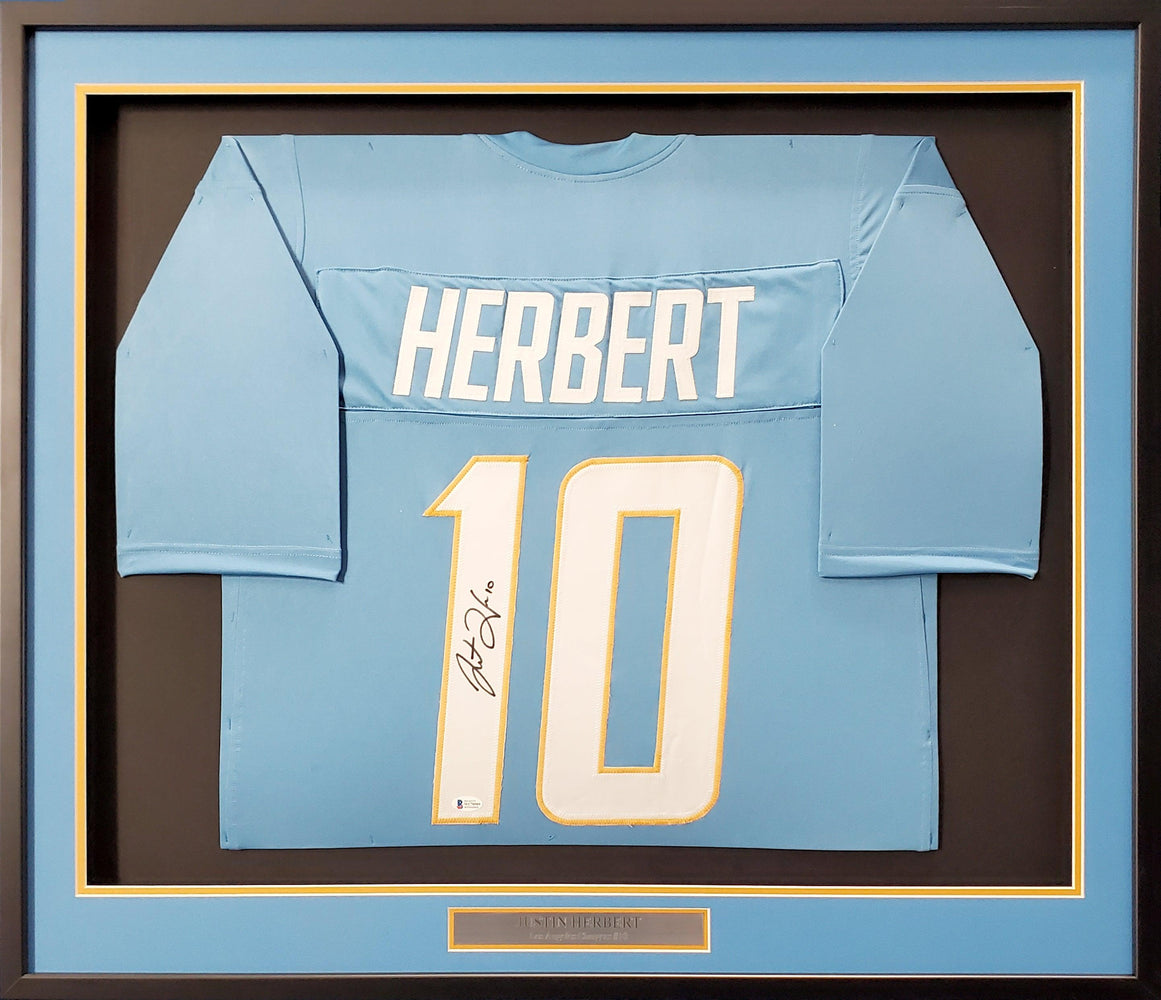 Los Angeles Chargers Justin Herbert Autographed Framed Powder Blue Jersey Beckett BAS Stock #191176 - RSA