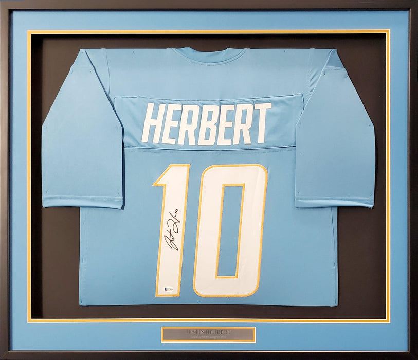 Los Angeles Chargers Justin Herbert Autographed Framed Powder Blue Jersey Beckett BAS Stock #191176 - RSA