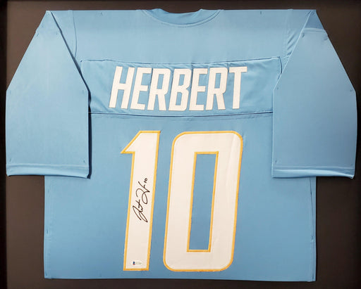Los Angeles Chargers Justin Herbert Autographed Framed Powder Blue Jersey Beckett BAS Stock #191176 - RSA