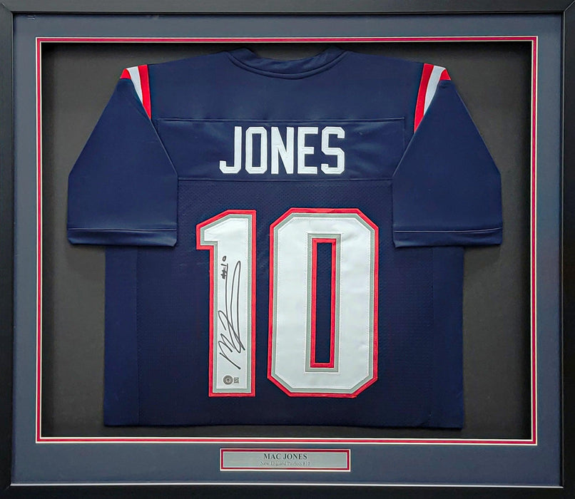 New England Patriots Mac Jones Autographed Framed Blue Jersey Beckett BAS QR Stock #202403 - RSA