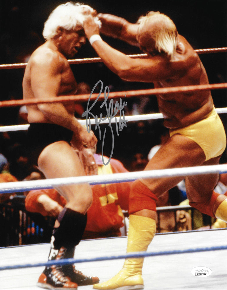 Ric Flair Autographed 11x14 Photo vs. Hulk Hogan "16x" JSA Stock #203604 - RSA