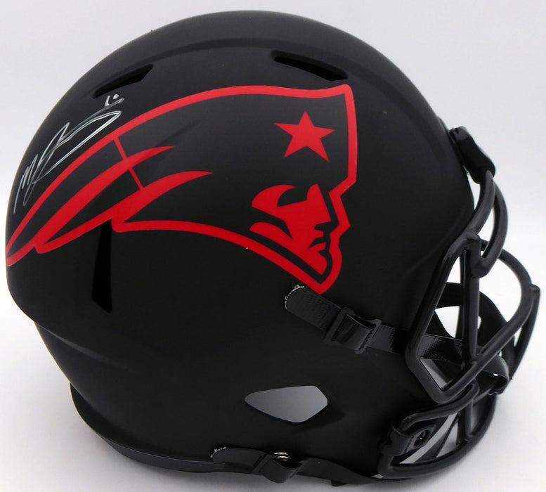 Mac Jones Autographed New England Patriots Eclipse Black Full Size Replica Speed Helmet (Light Auto) Beckett BAS QR #WS86054 - RSA