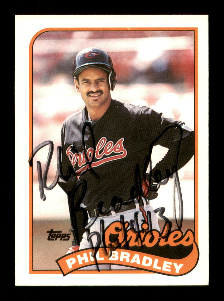 Phil Bradley Autographed 1989 Topps Traded Card #13T Baltimore Orioles SKU #188130 - RSA